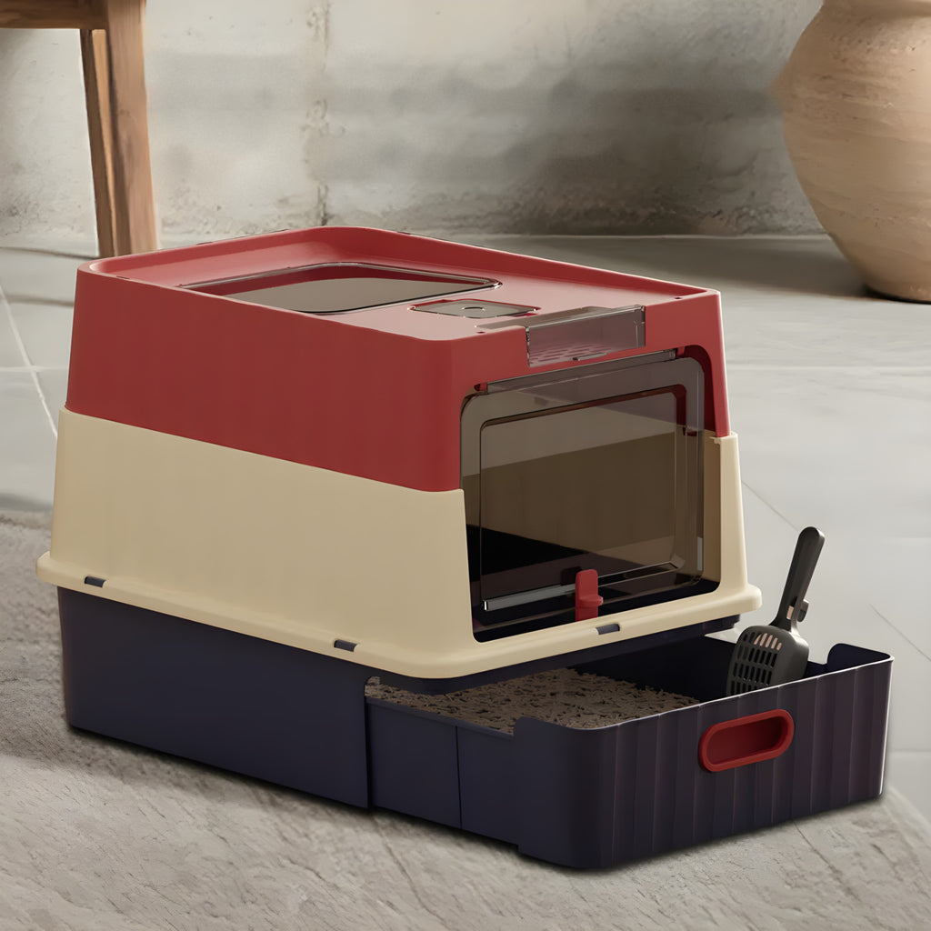 Enclosed cat litter box with pull-out drawer tray in a modern home