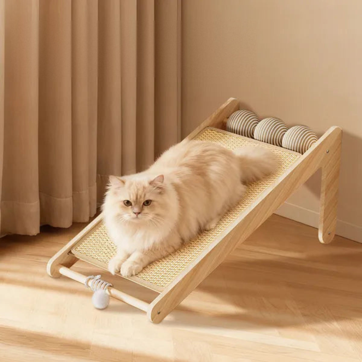 Cat napping on the scratcher in lounger mode
