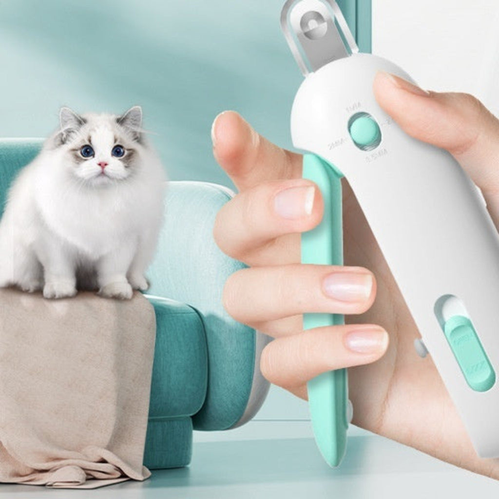 Holding the cat nail clipper with a comfortable grip