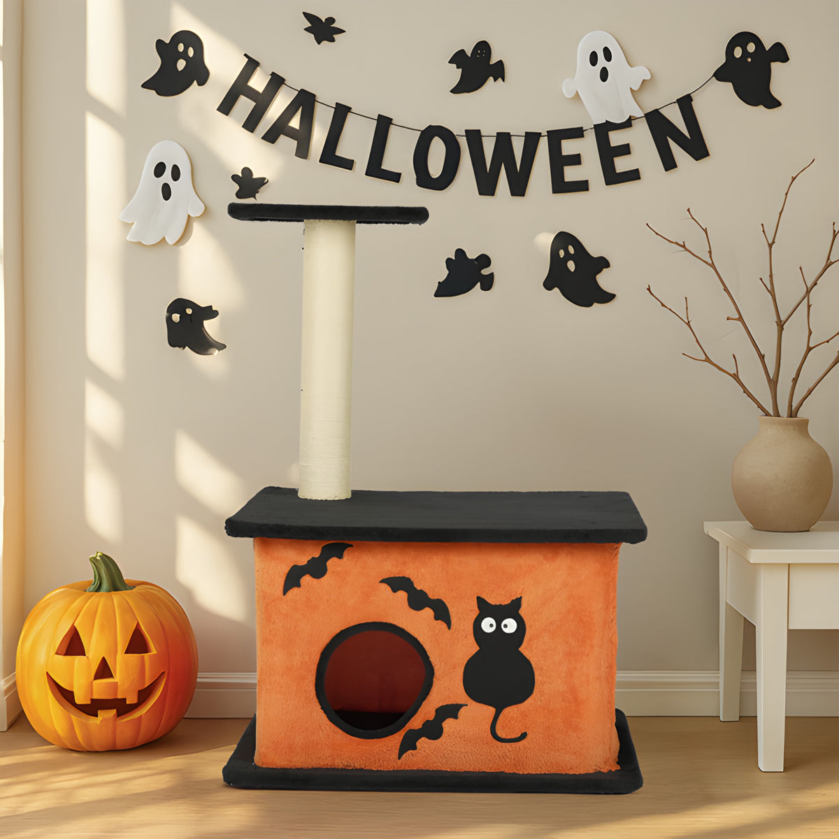 Halloween cat tower with spacious cat condo styled with pumpkin and Halloween decor